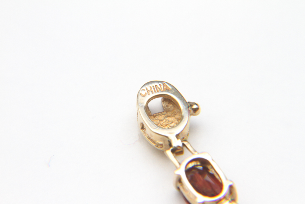 10K Gold and Garnet Tennis Bracelet