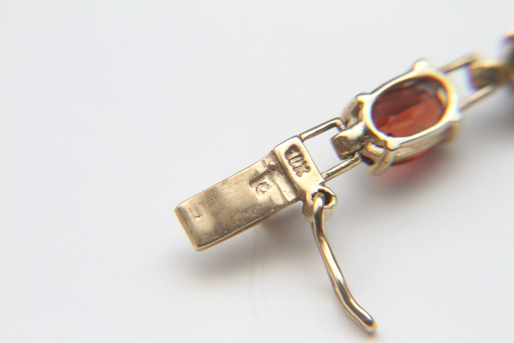 10K Gold and Garnet Tennis Bracelet