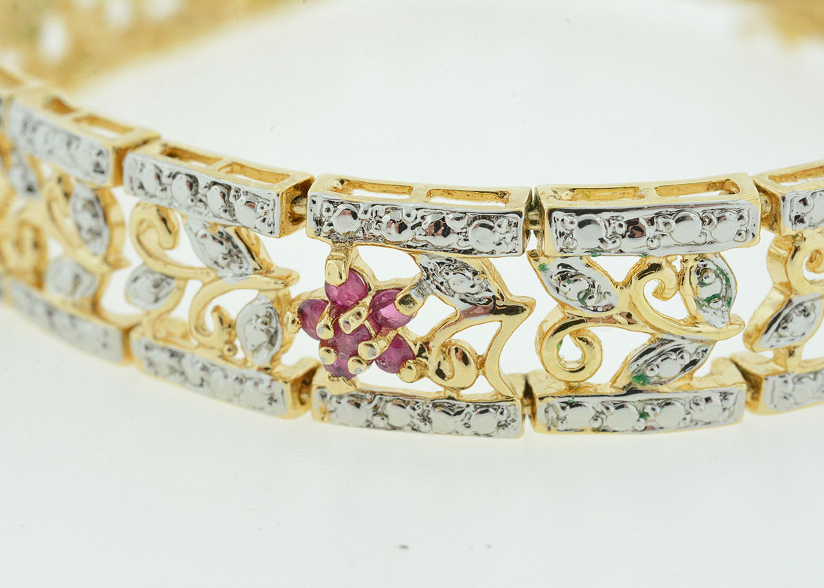 Sterling Silver Bracelet with Emerald, Ruby, and Blue Sapphire Flowers