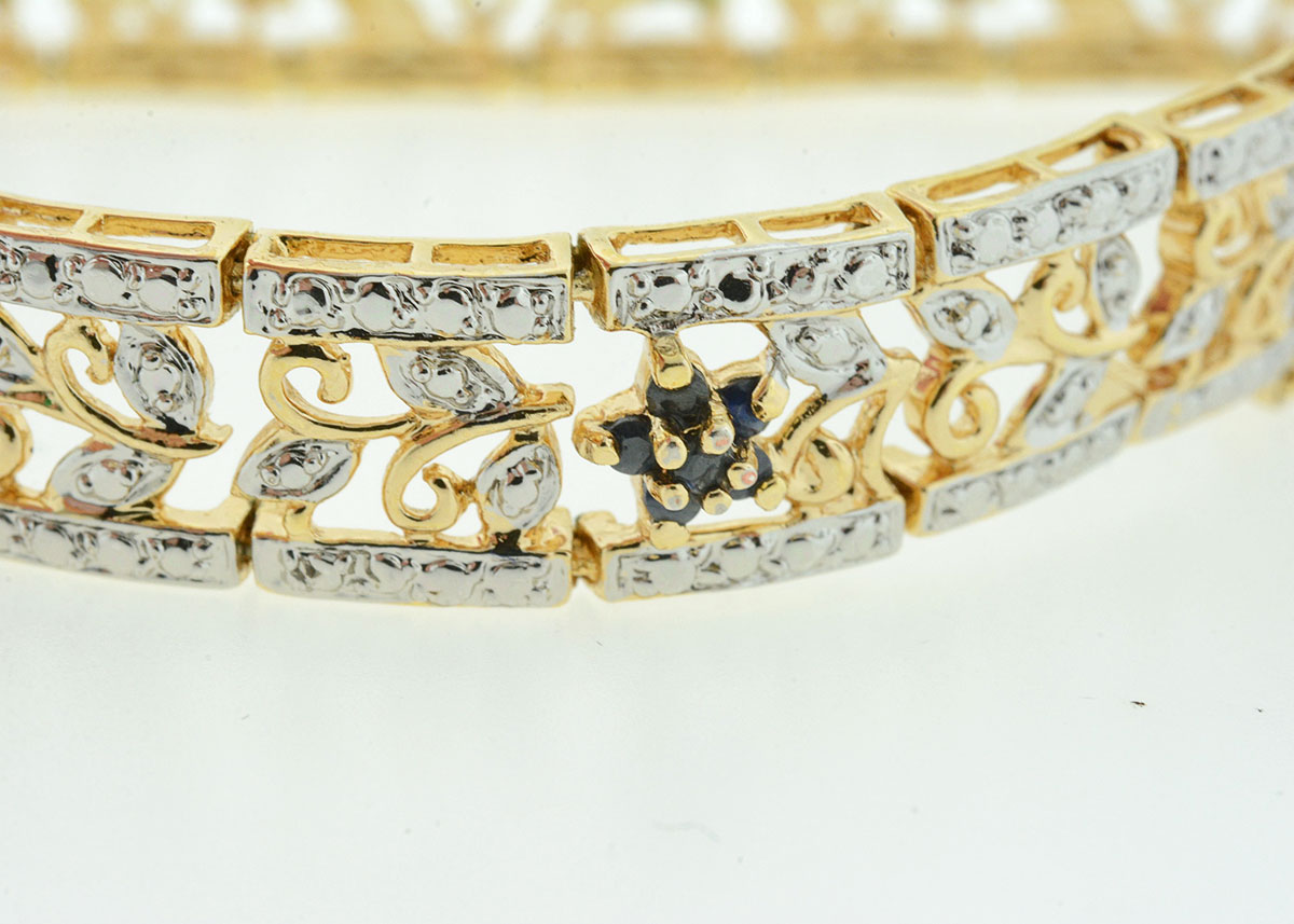 Sterling Silver Bracelet with Emerald, Ruby, and Blue Sapphire Flowers