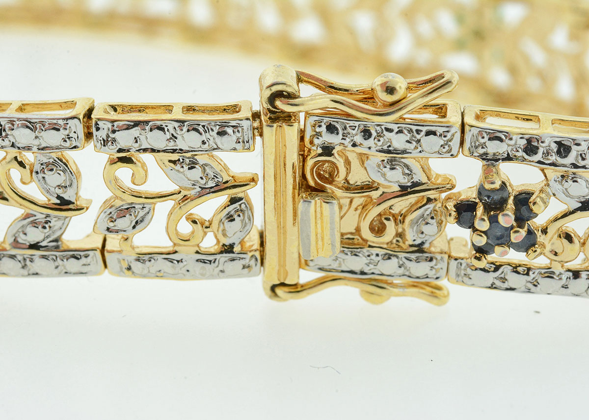 Sterling Silver Bracelet with Emerald, Ruby, and Blue Sapphire Flowers