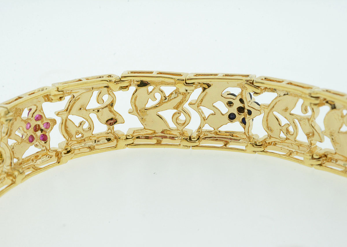 Sterling Silver Bracelet with Emerald, Ruby, and Blue Sapphire Flowers