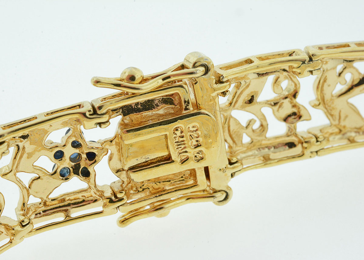 Sterling Silver Bracelet with Emerald, Ruby, and Blue Sapphire Flowers