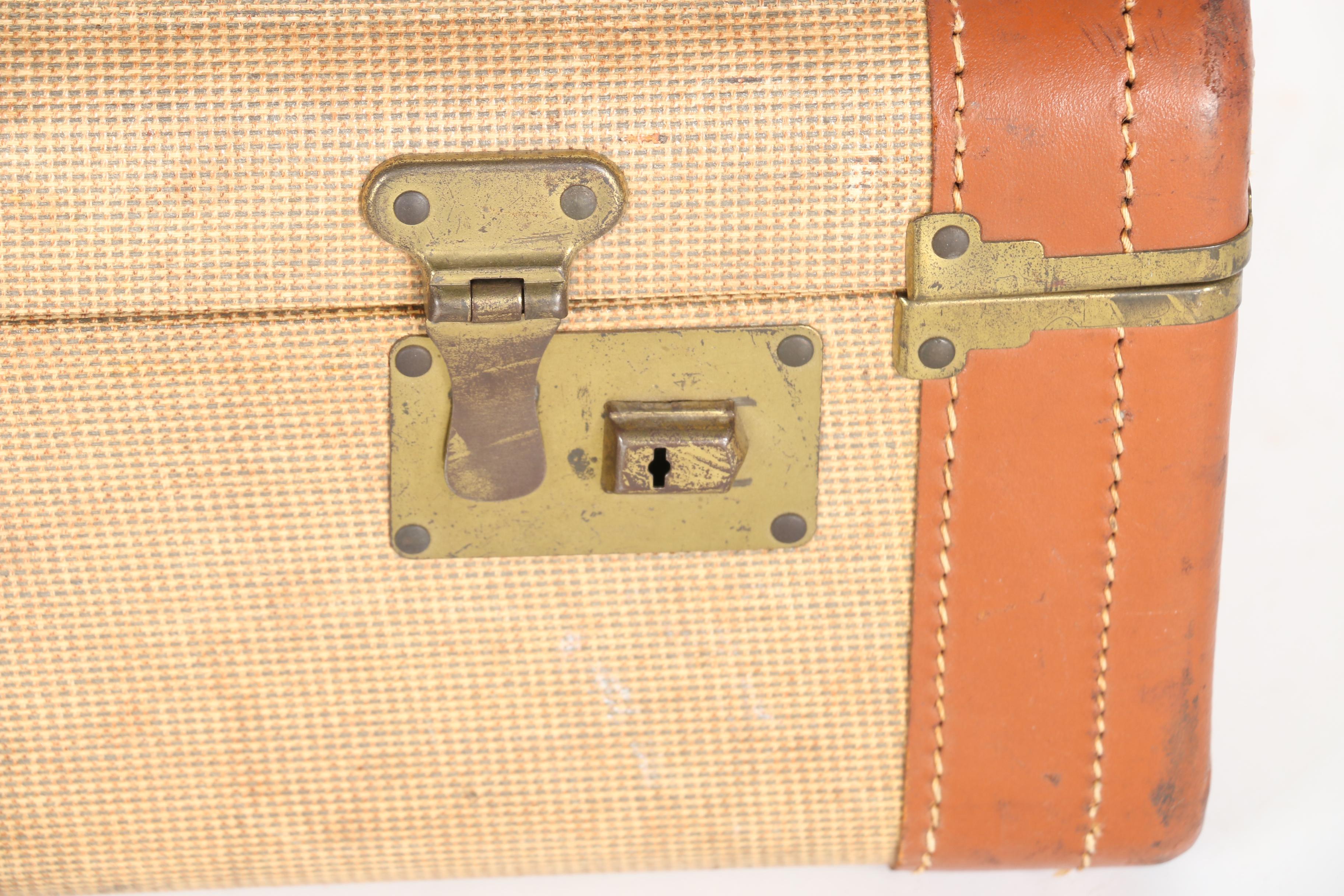 Three Vintage Suitcases