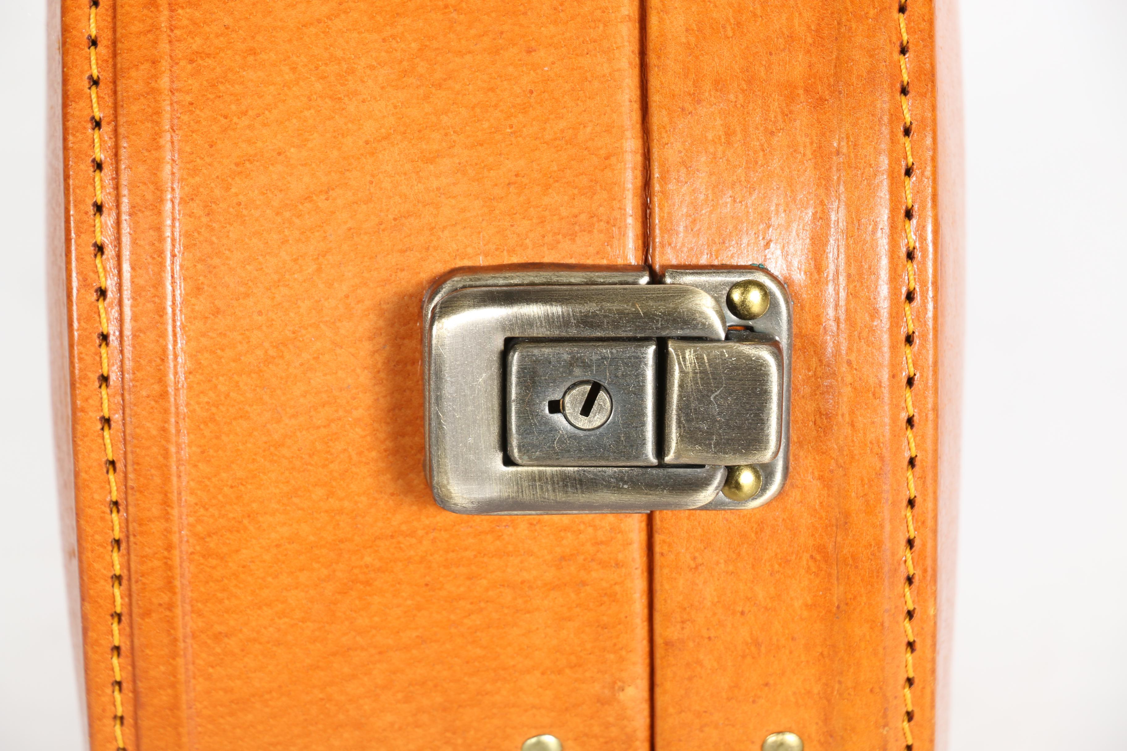 Three Vintage Suitcases