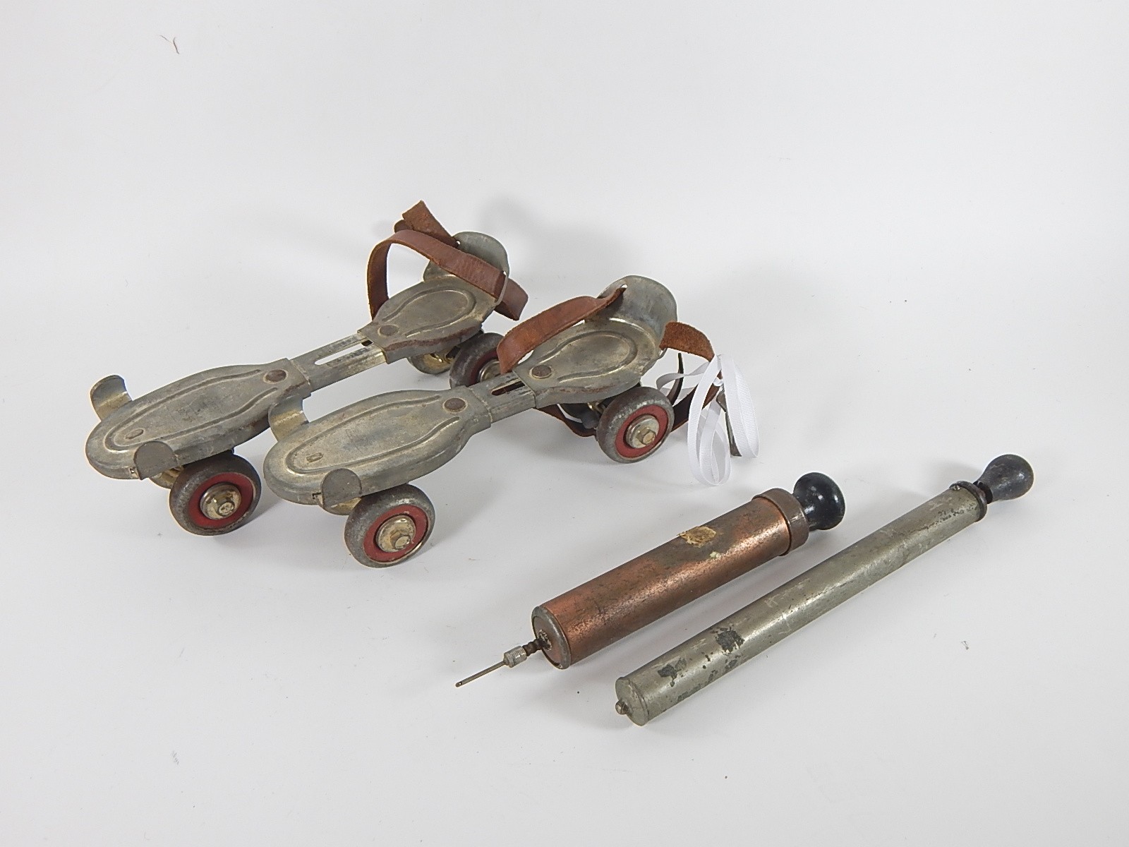Globe Metal Skates and Vintage Air Pumps
