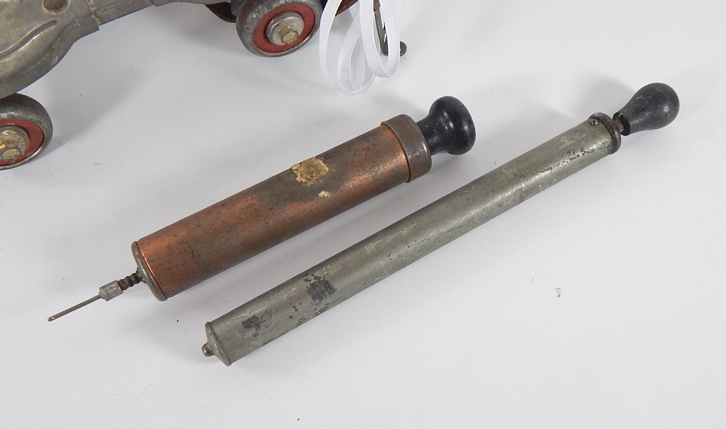 Globe Metal Skates and Vintage Air Pumps