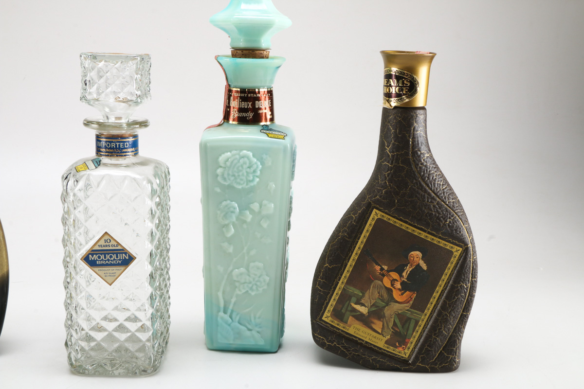 Seven Vintage Branded Decanters and Bottles