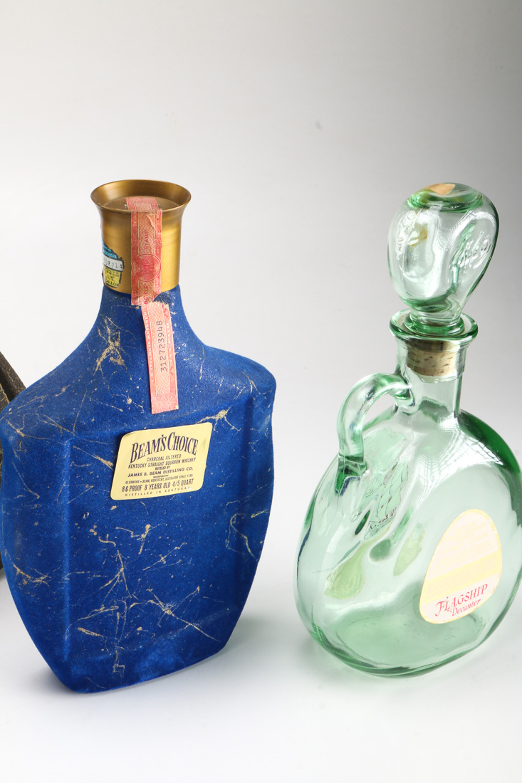 Seven Vintage Branded Decanters and Bottles