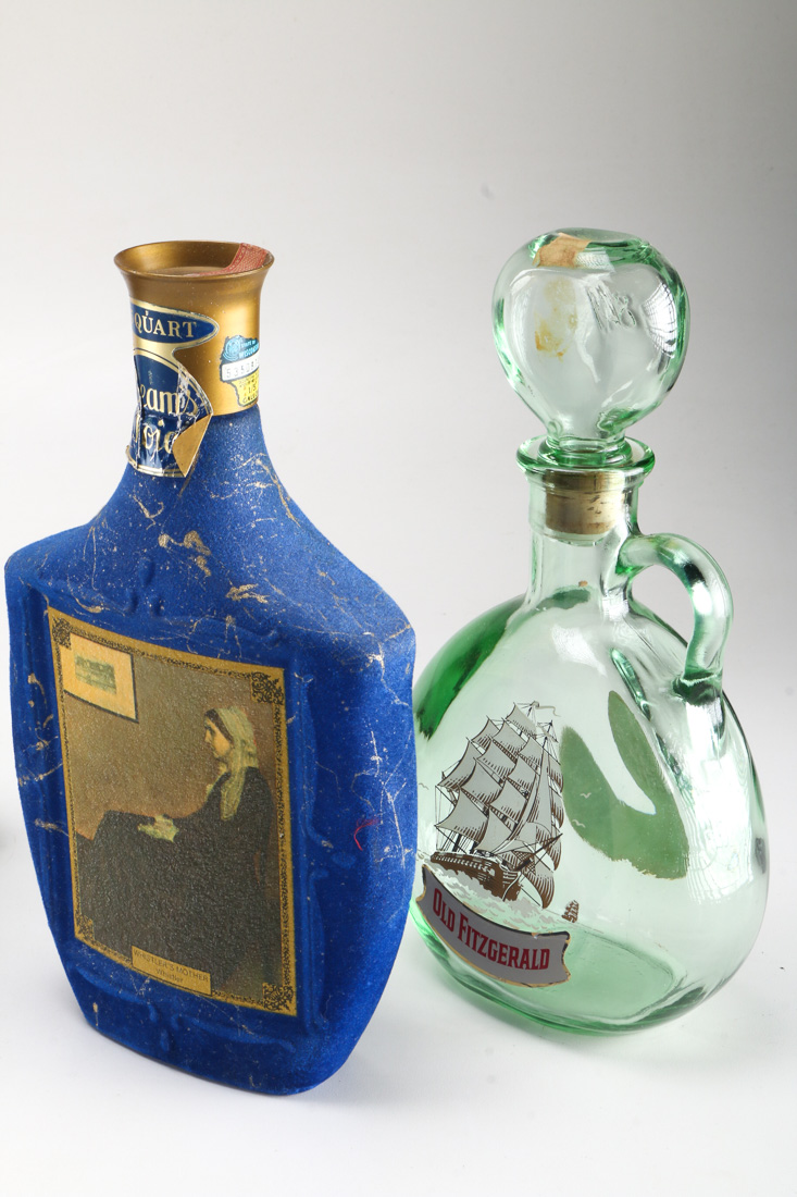 Seven Vintage Branded Decanters and Bottles