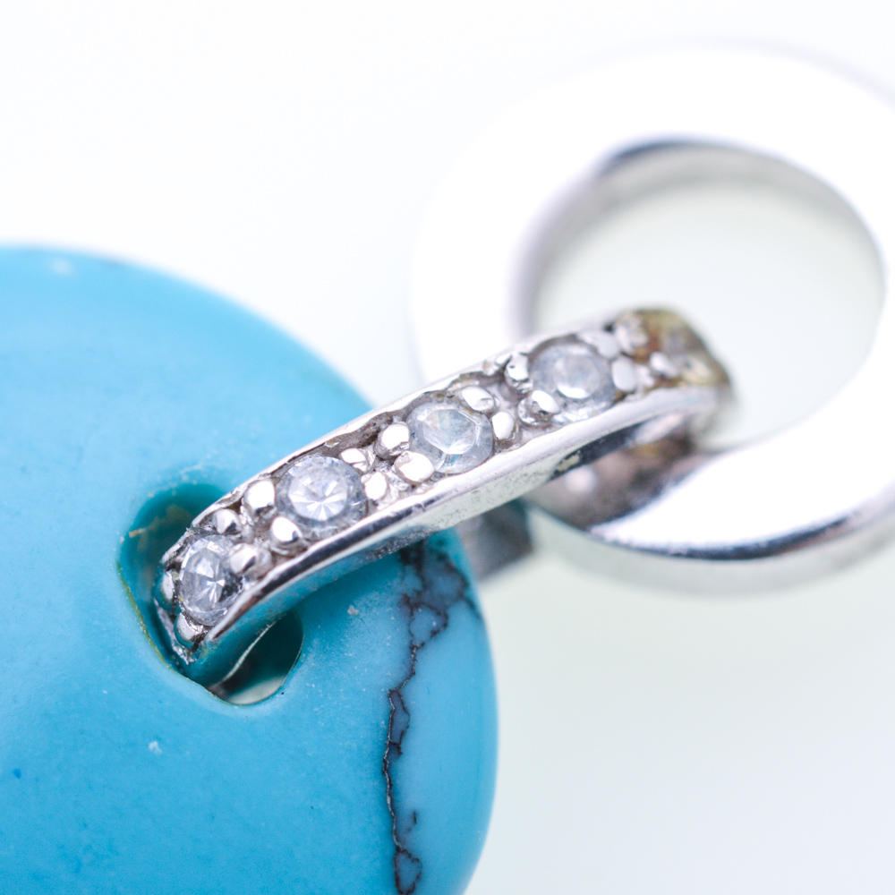 Sterling Silver Synthetic Turquoise and Cubic Zirconia Ring and Earrings