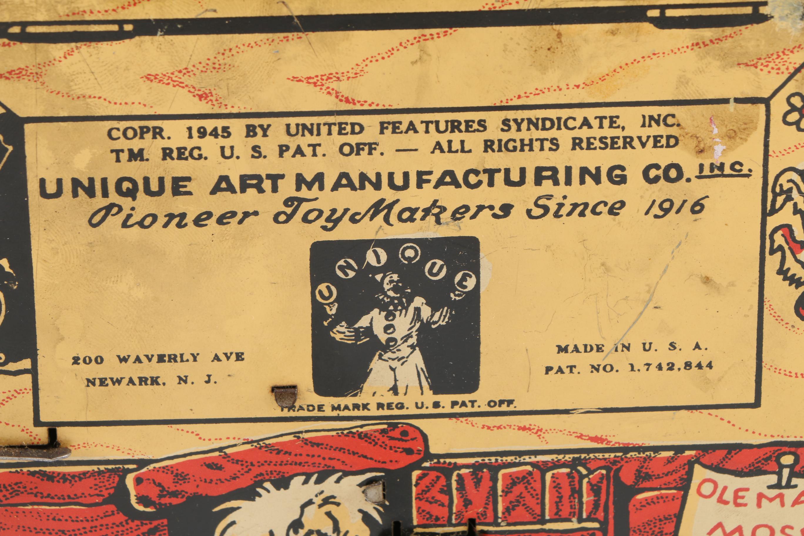 1945 Unique Art Mfg Co. "Lil' Abner Dogpatch Band" Tin Music Box