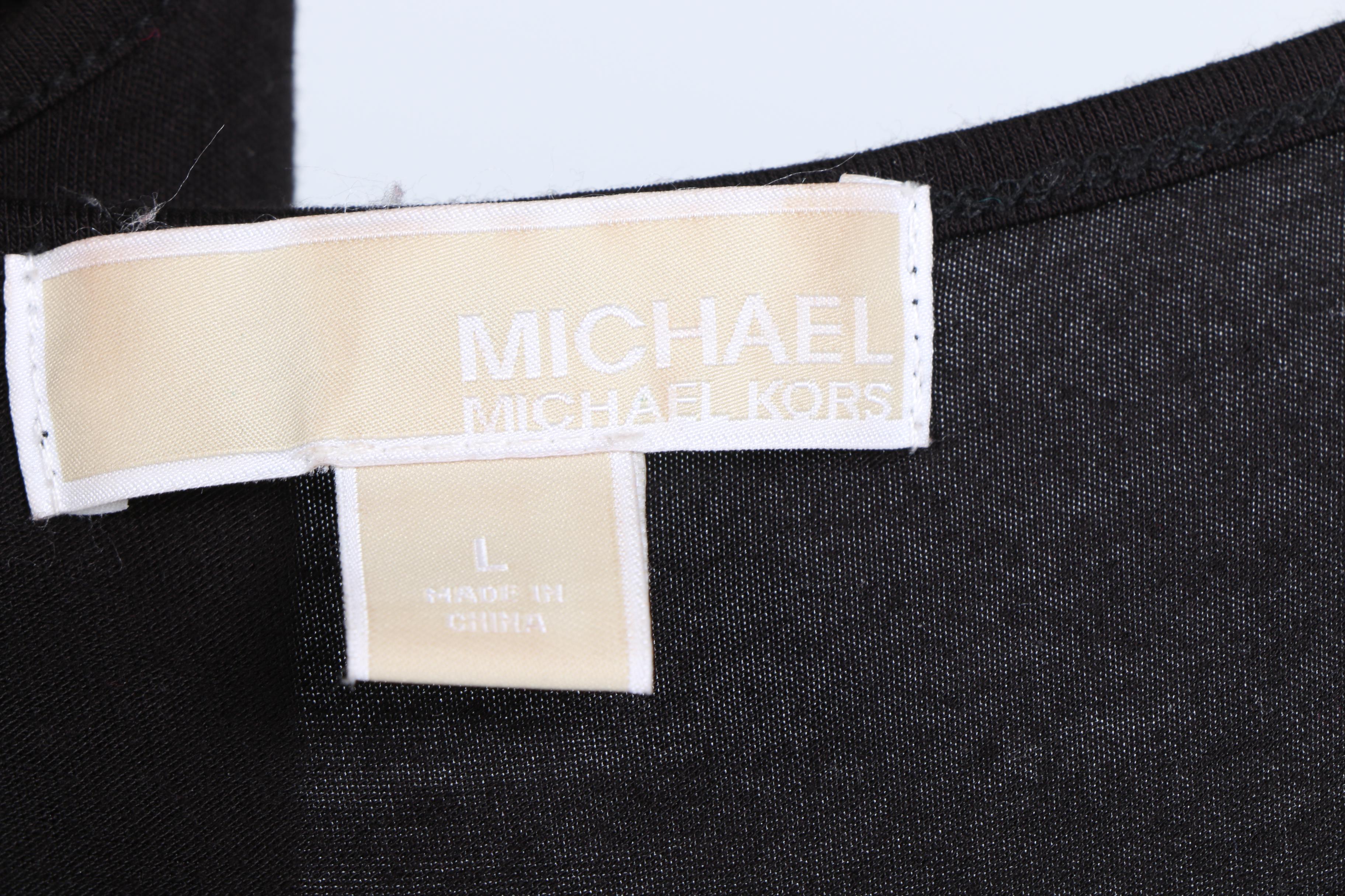 Women's Designer Clothing Collection Featuring Tory Burch