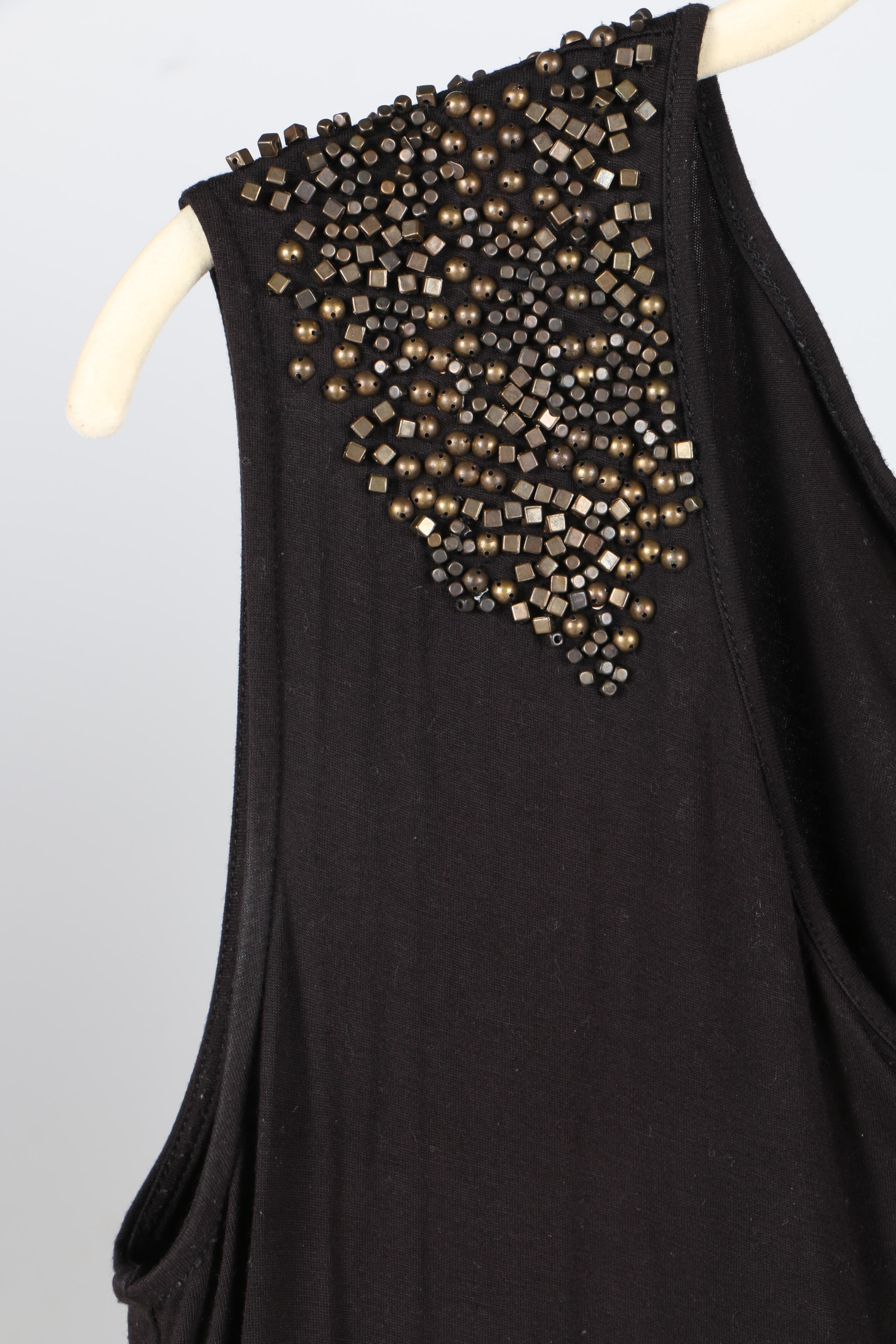 Women's Designer Clothing Collection Featuring Tory Burch