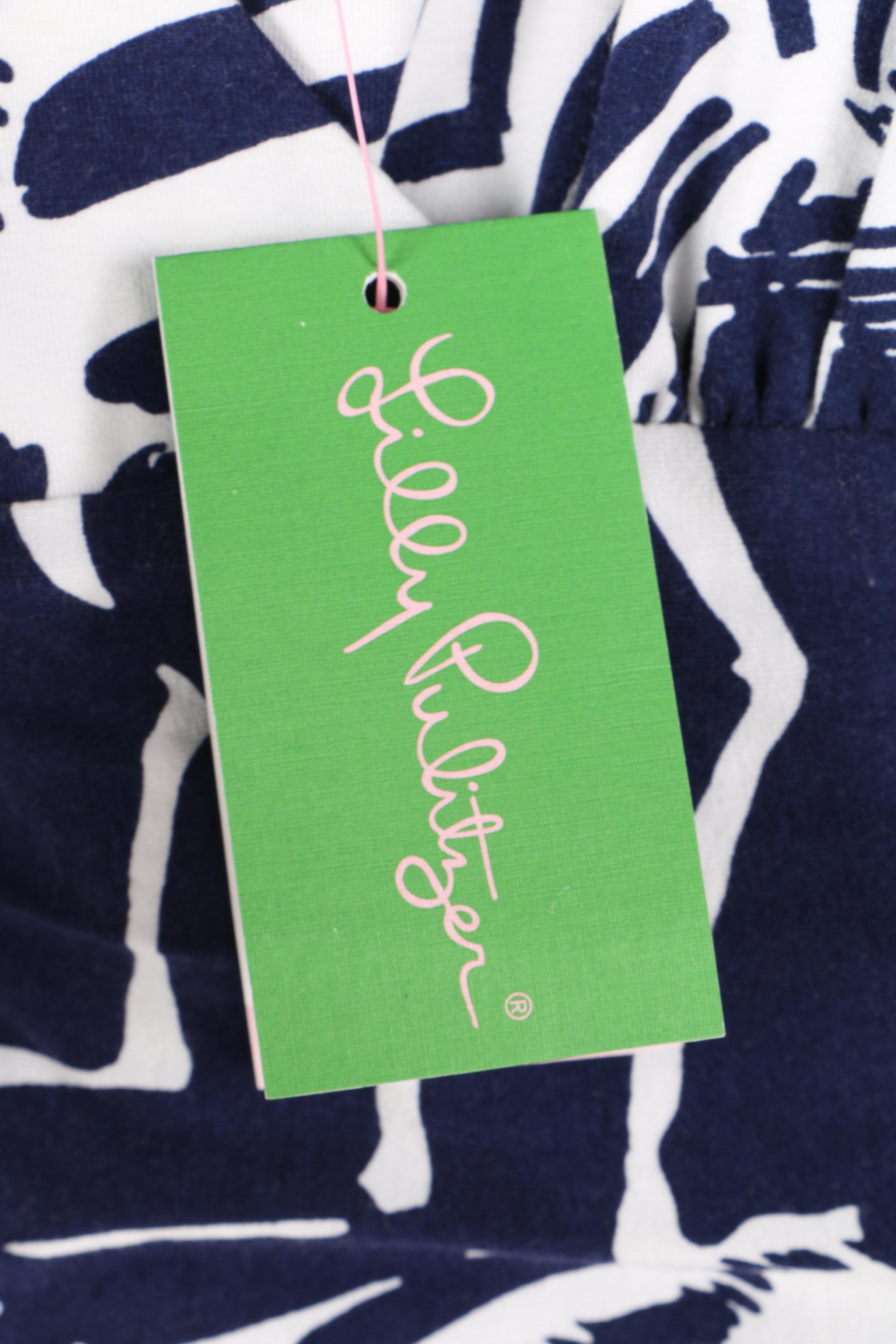 Women's Designer Clothing Collection Featuring Tory Burch