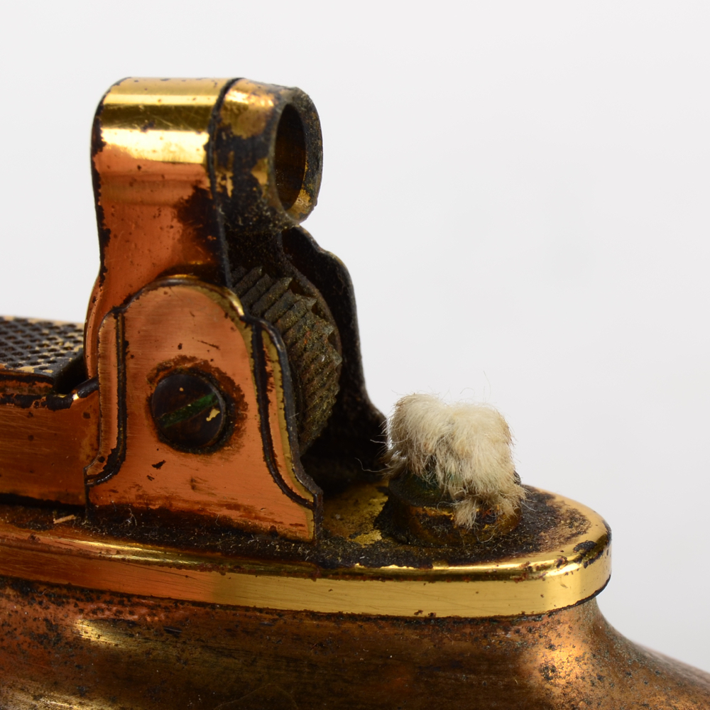 1950s-1960s Triangular Cave Man Idealine Lighter