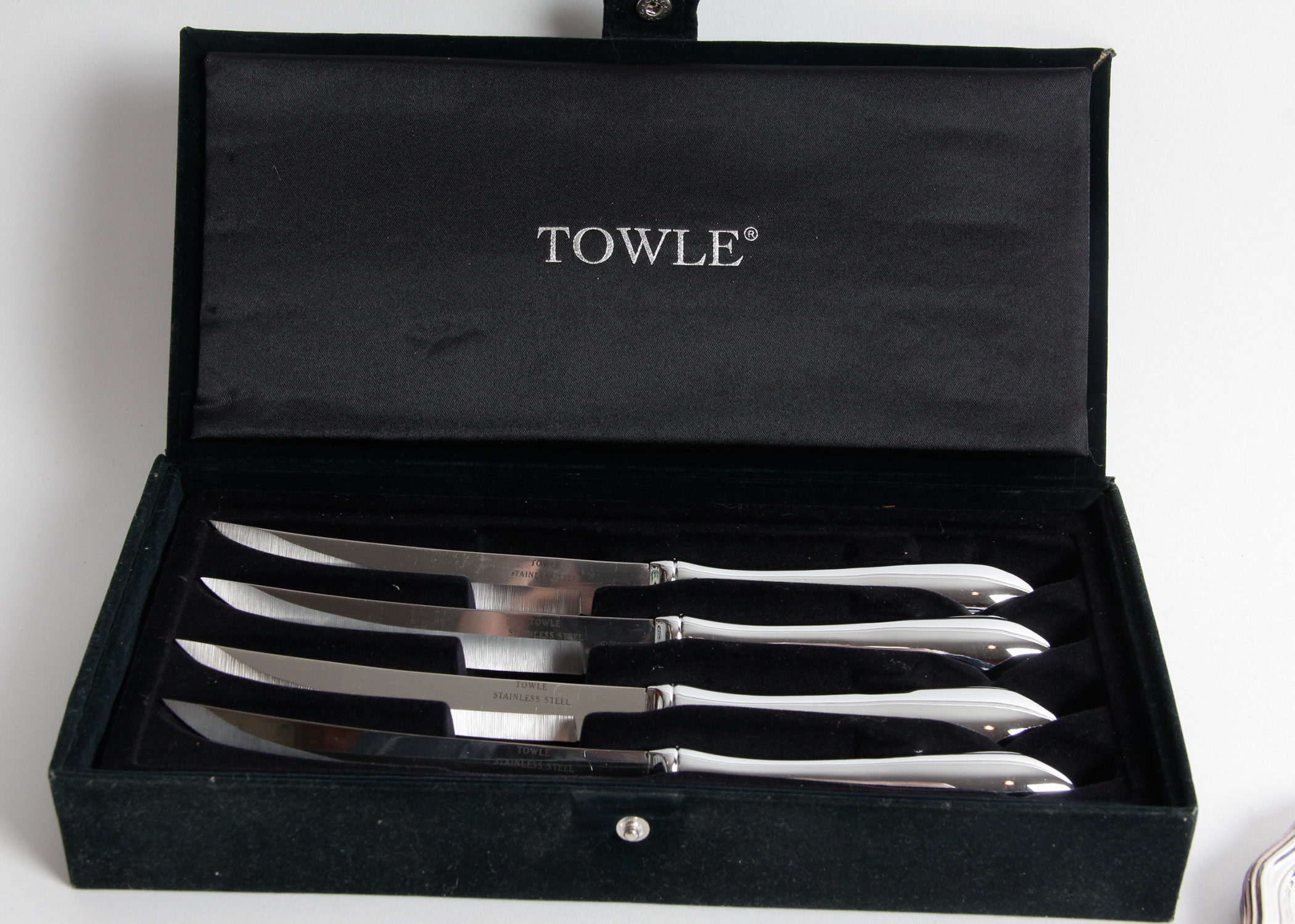Set of Towle Steak Knives, a Flint Arrowhead Carving Set, and Silver Plated Coasters