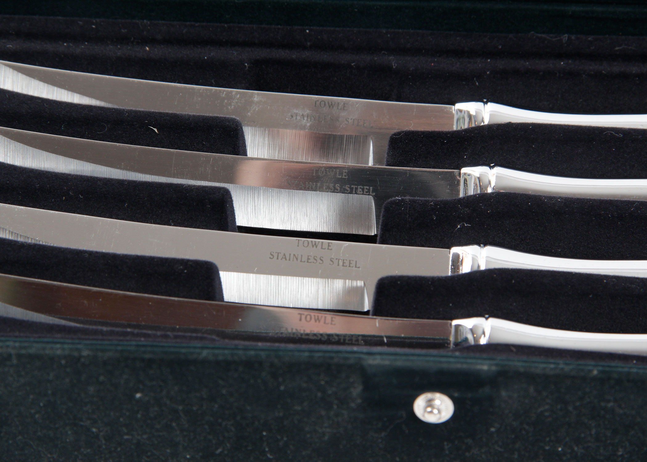 Set of Towle Steak Knives, a Flint Arrowhead Carving Set, and Silver Plated Coasters