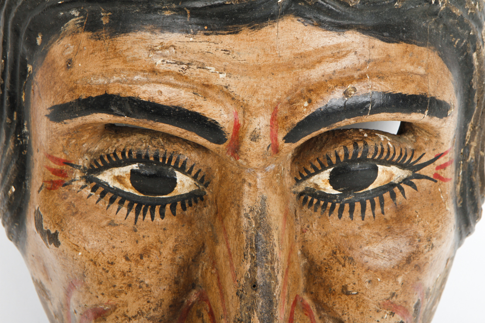 A Hand Painted Wooden Mask