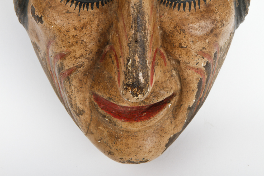 A Hand Painted Wooden Mask