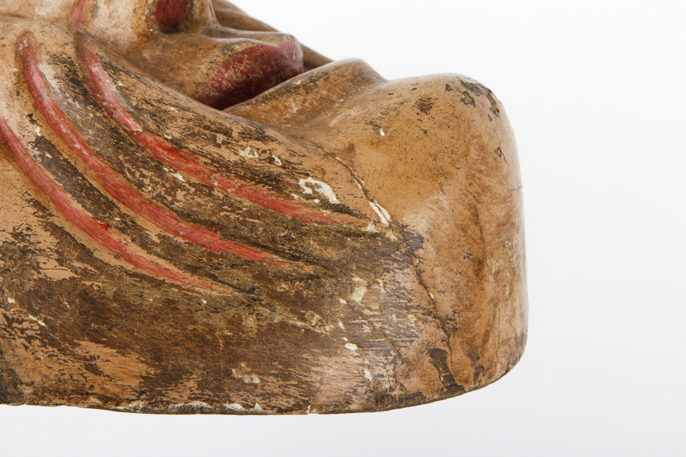 A Hand Painted Wooden Mask