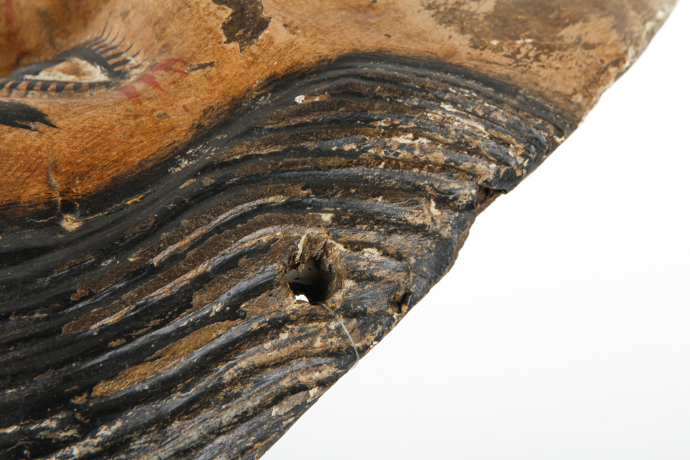 A Hand Painted Wooden Mask