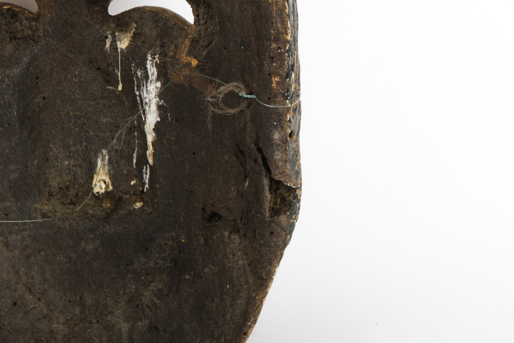 A Hand Painted Wooden Mask