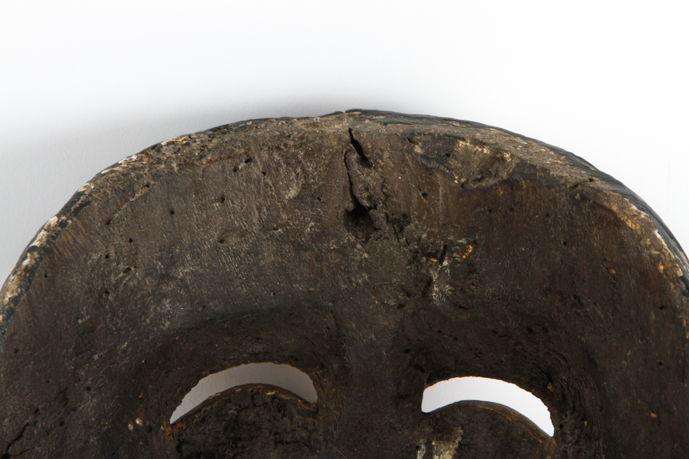 A Hand Painted Wooden Mask