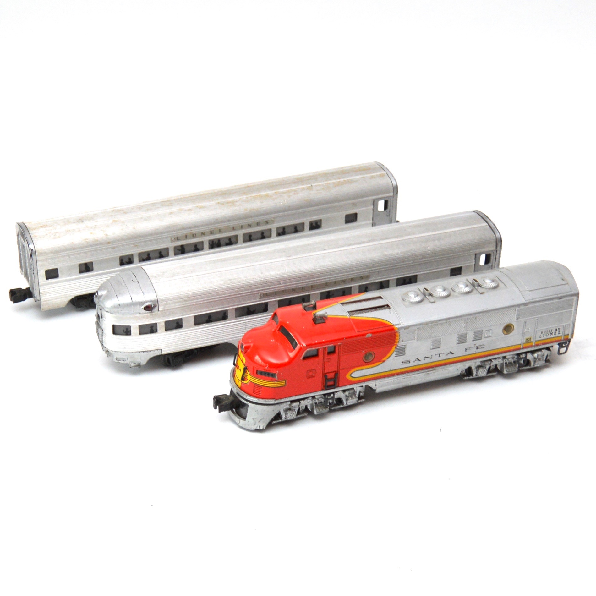 Vintage Lionel Santa Fe Locomotive and Two Passenger Cars