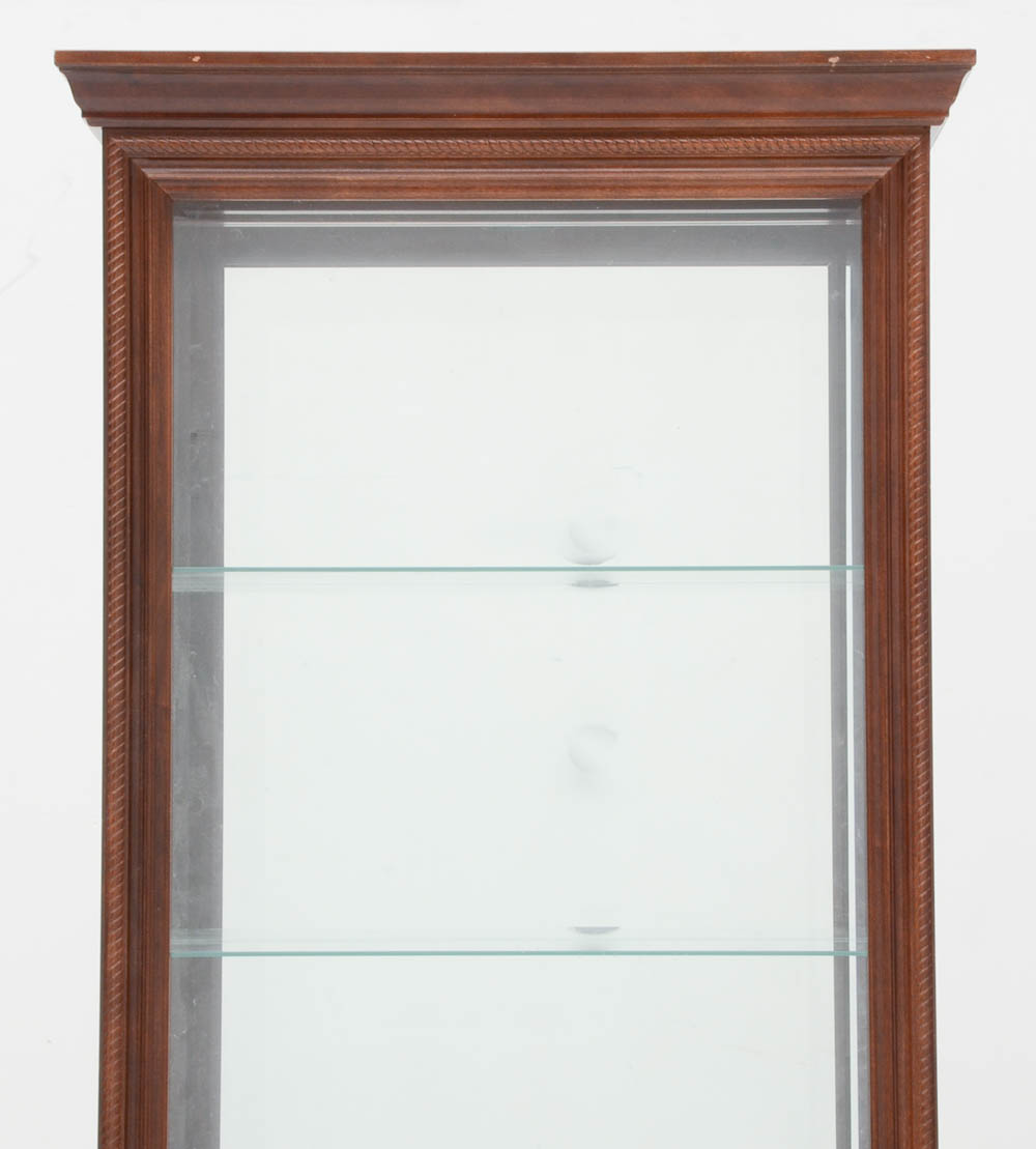 Howard Miller illuminated Cherry Curio Cabinet