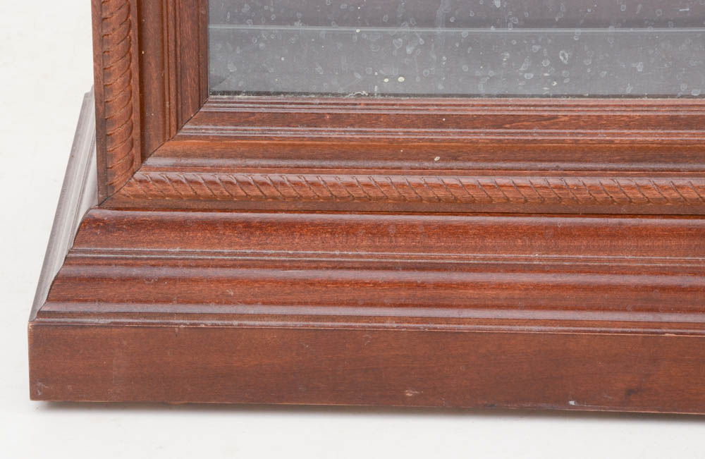 Howard Miller illuminated Cherry Curio Cabinet