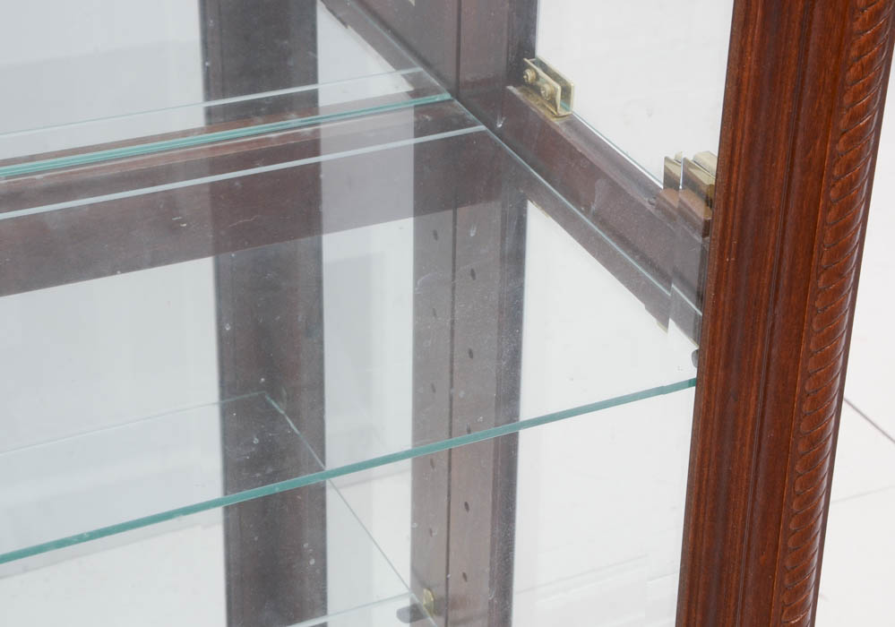 Howard Miller illuminated Cherry Curio Cabinet