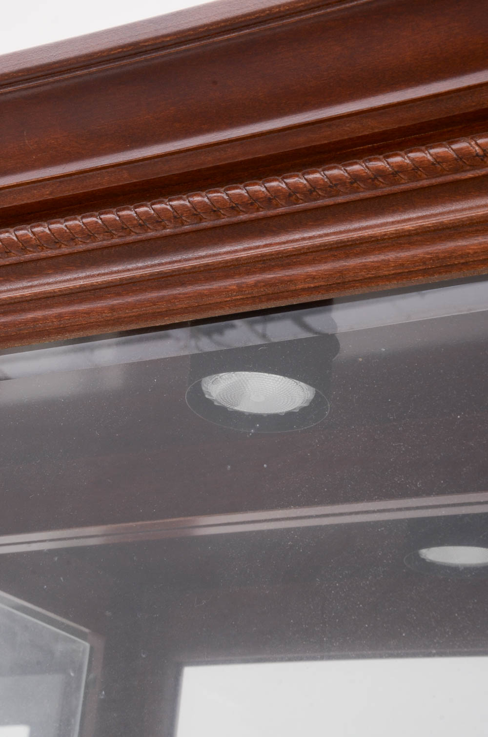 Howard Miller illuminated Cherry Curio Cabinet