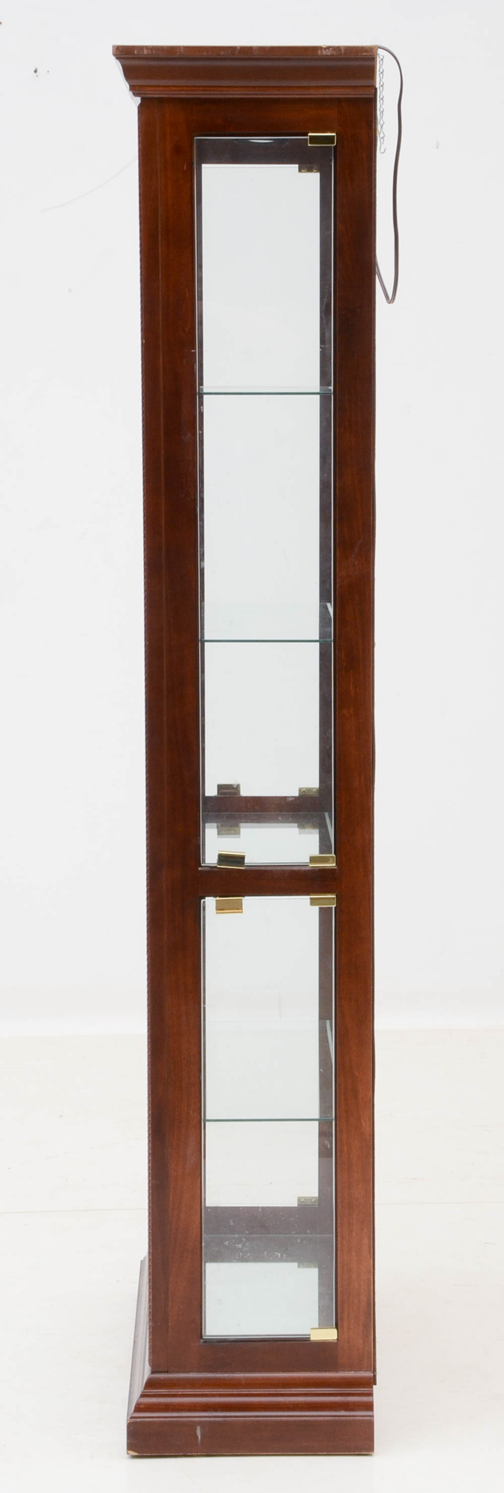 Howard Miller illuminated Cherry Curio Cabinet