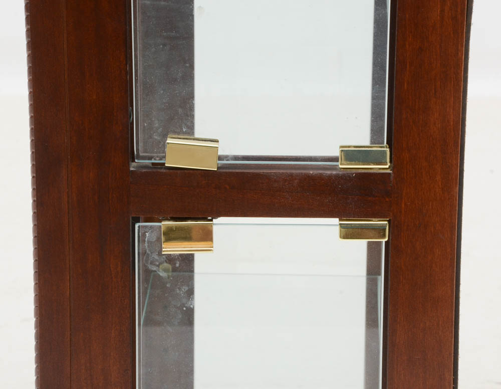 Howard Miller illuminated Cherry Curio Cabinet