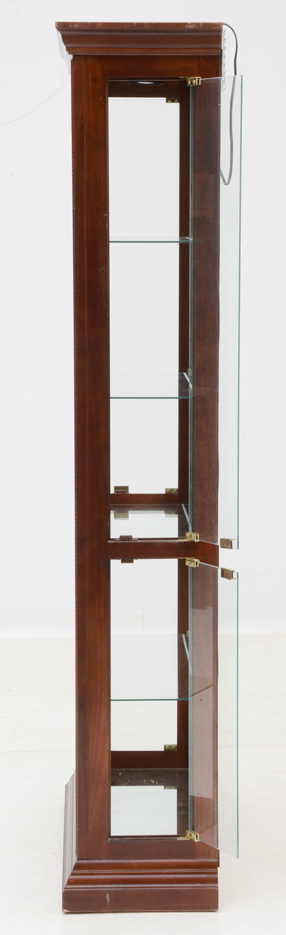 Howard Miller illuminated Cherry Curio Cabinet