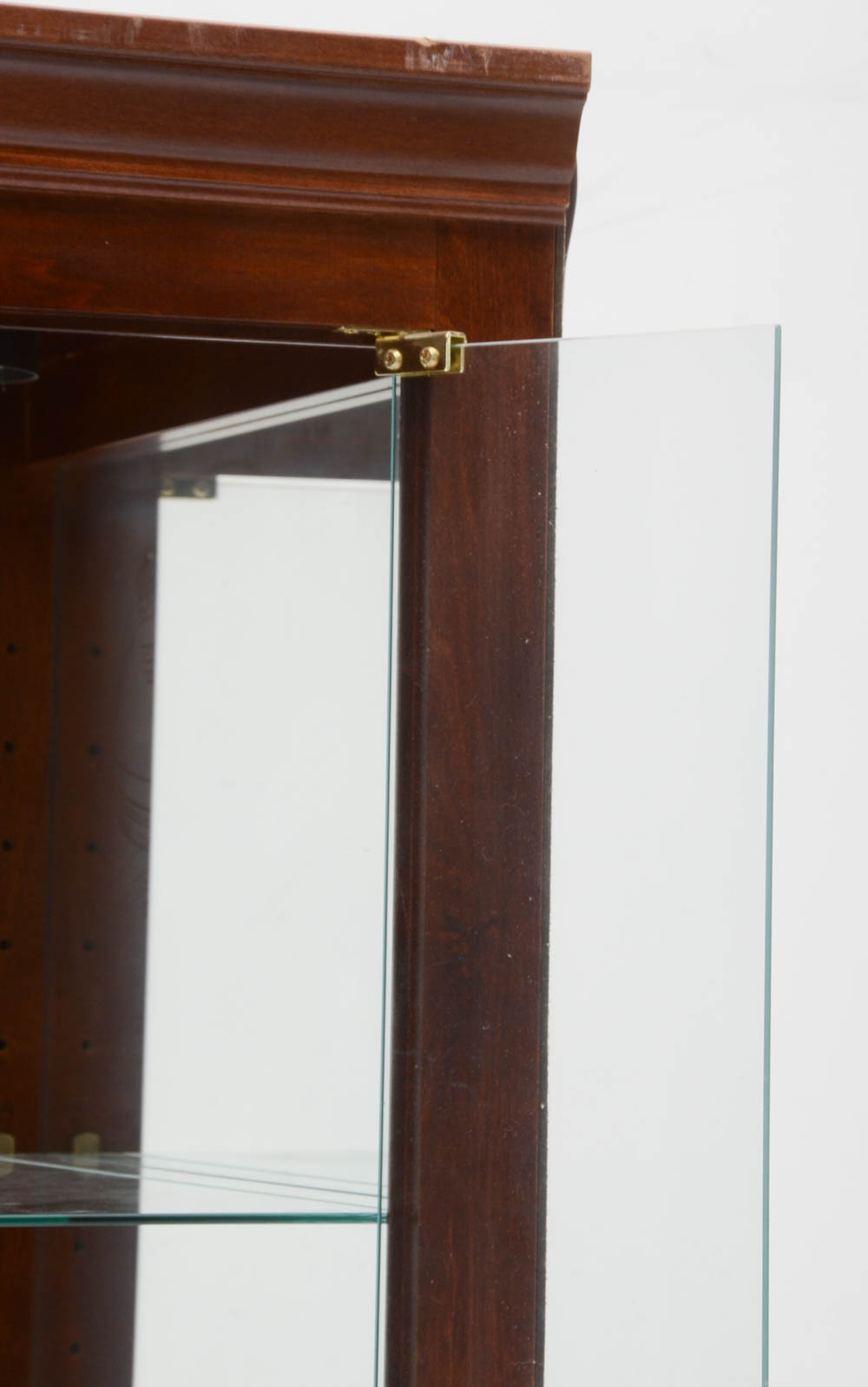 Howard Miller illuminated Cherry Curio Cabinet