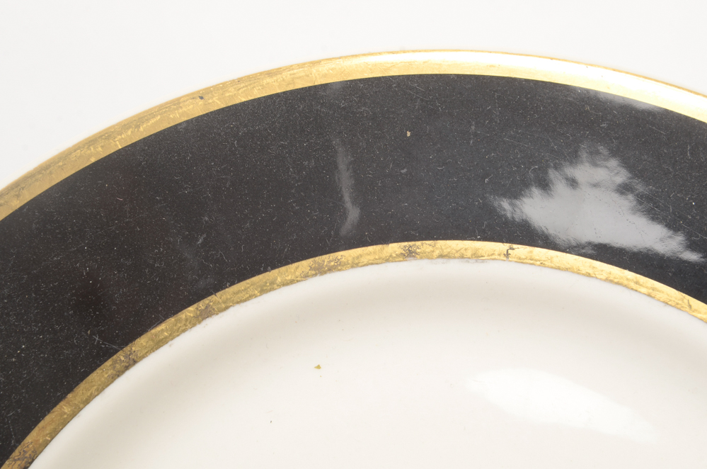 Eight "Clyde's" Dinner Plates