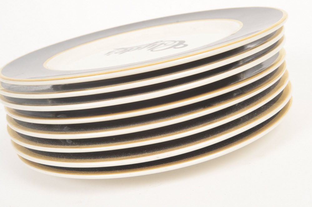 Eight "Clyde's" Dinner Plates