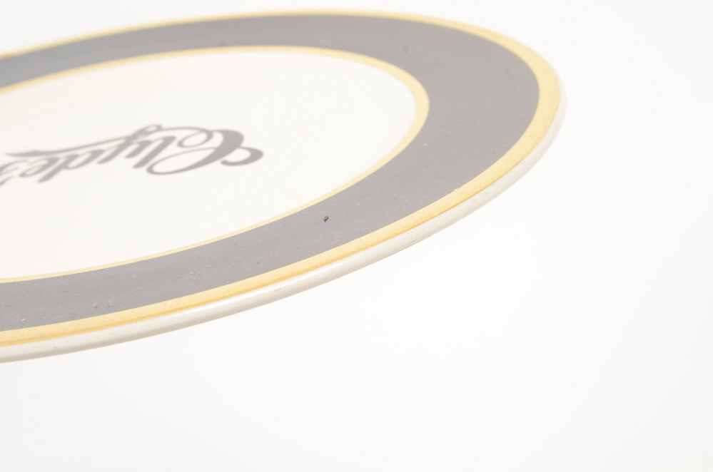 Eight "Clyde's" Dinner Plates