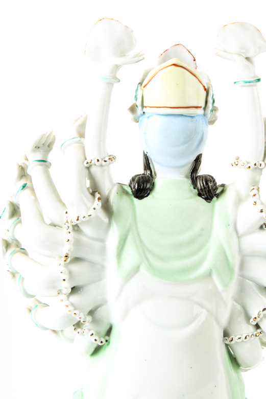 Doumu Porcelain Statue