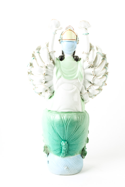 Doumu Porcelain Statue