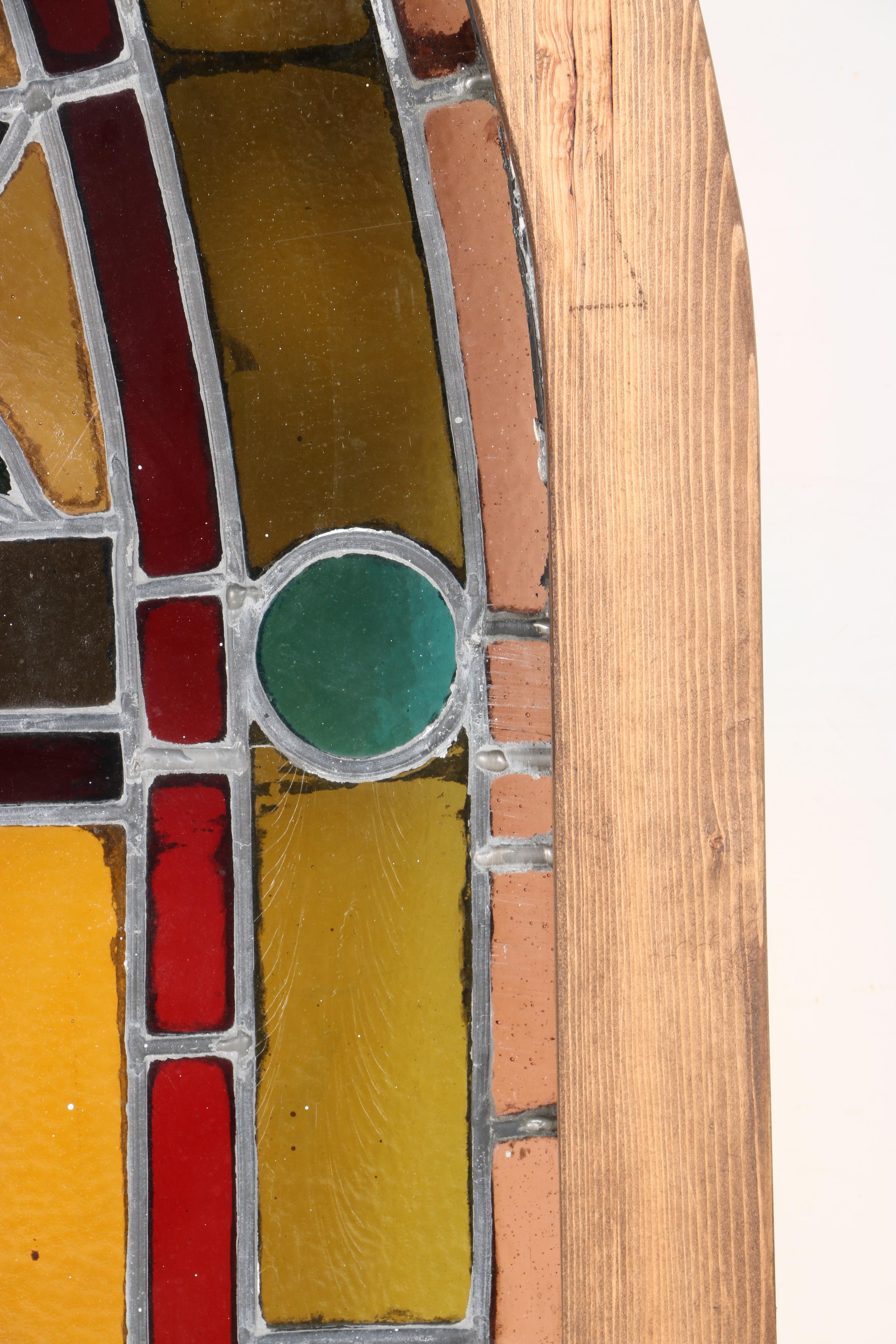 Antique Arched Stained Glass Window