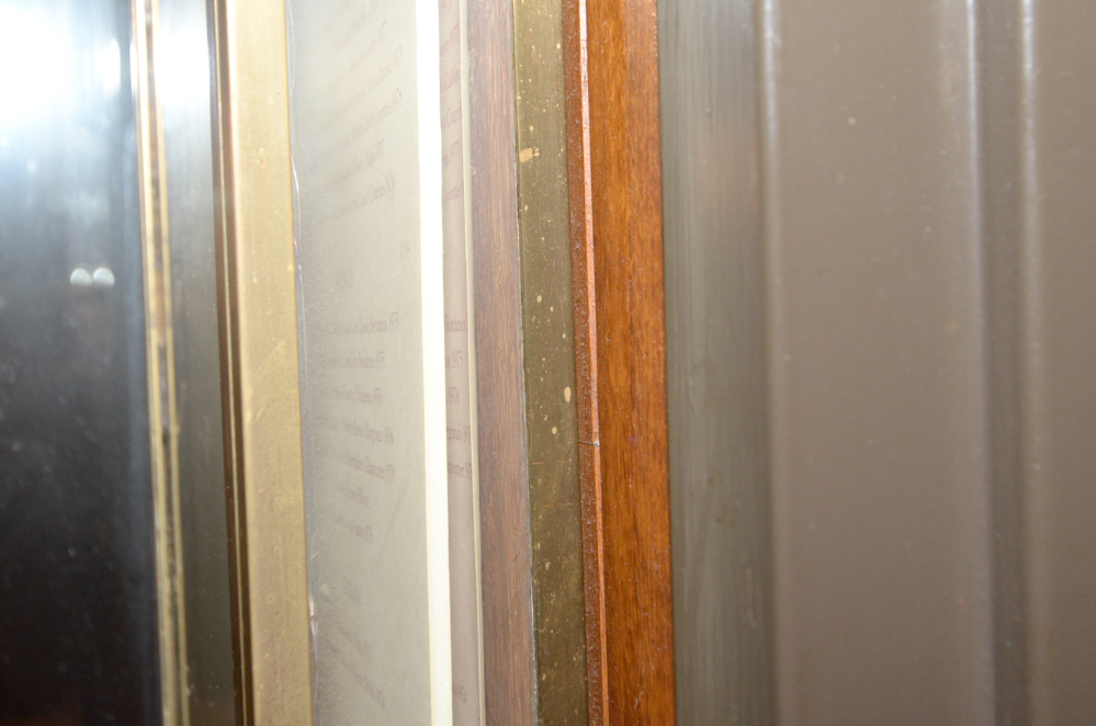 Glass and Brass Wine List Display Case