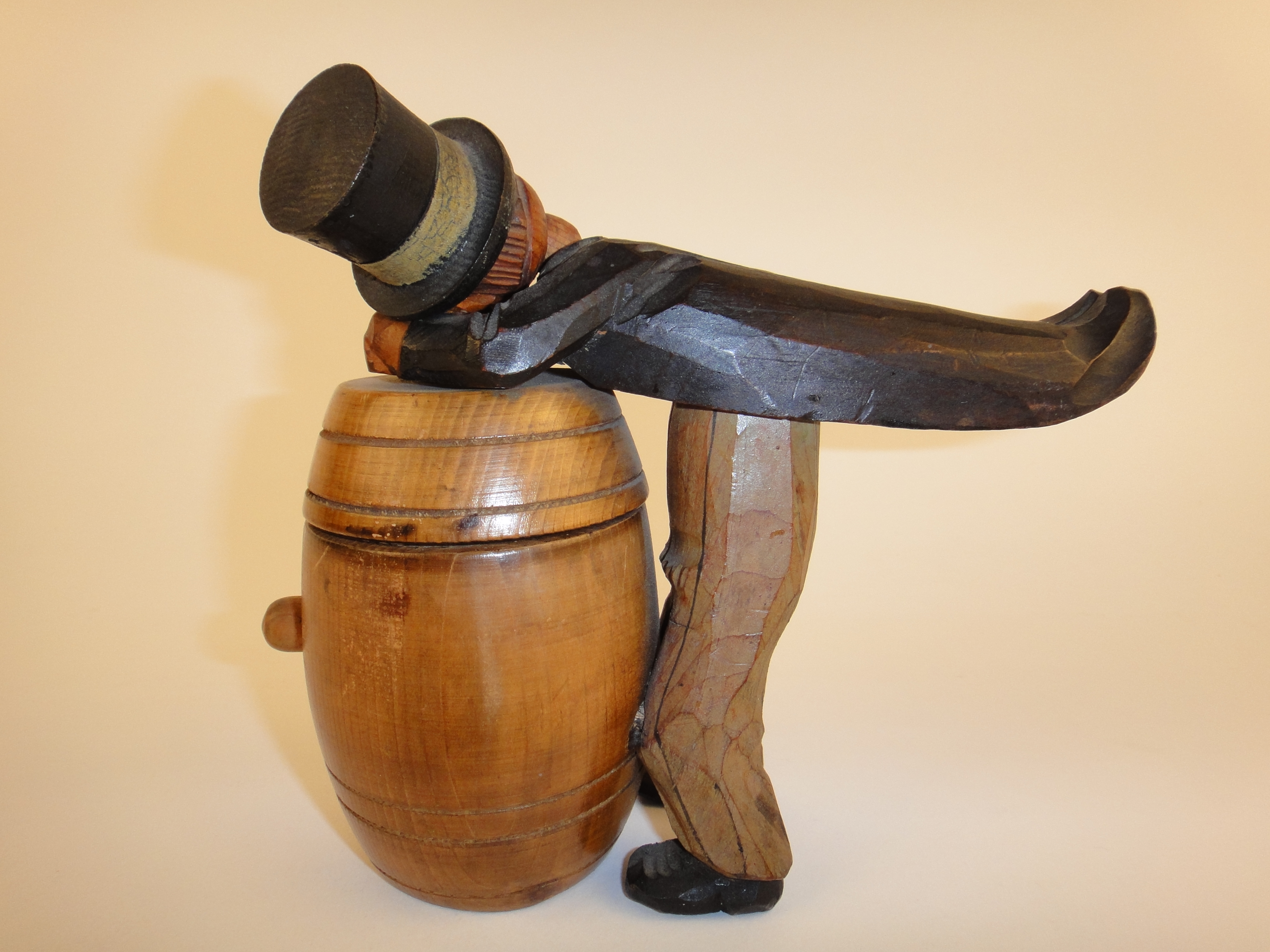 ANRI Wood Carved Man Over Barrel Cigarette Match Holder