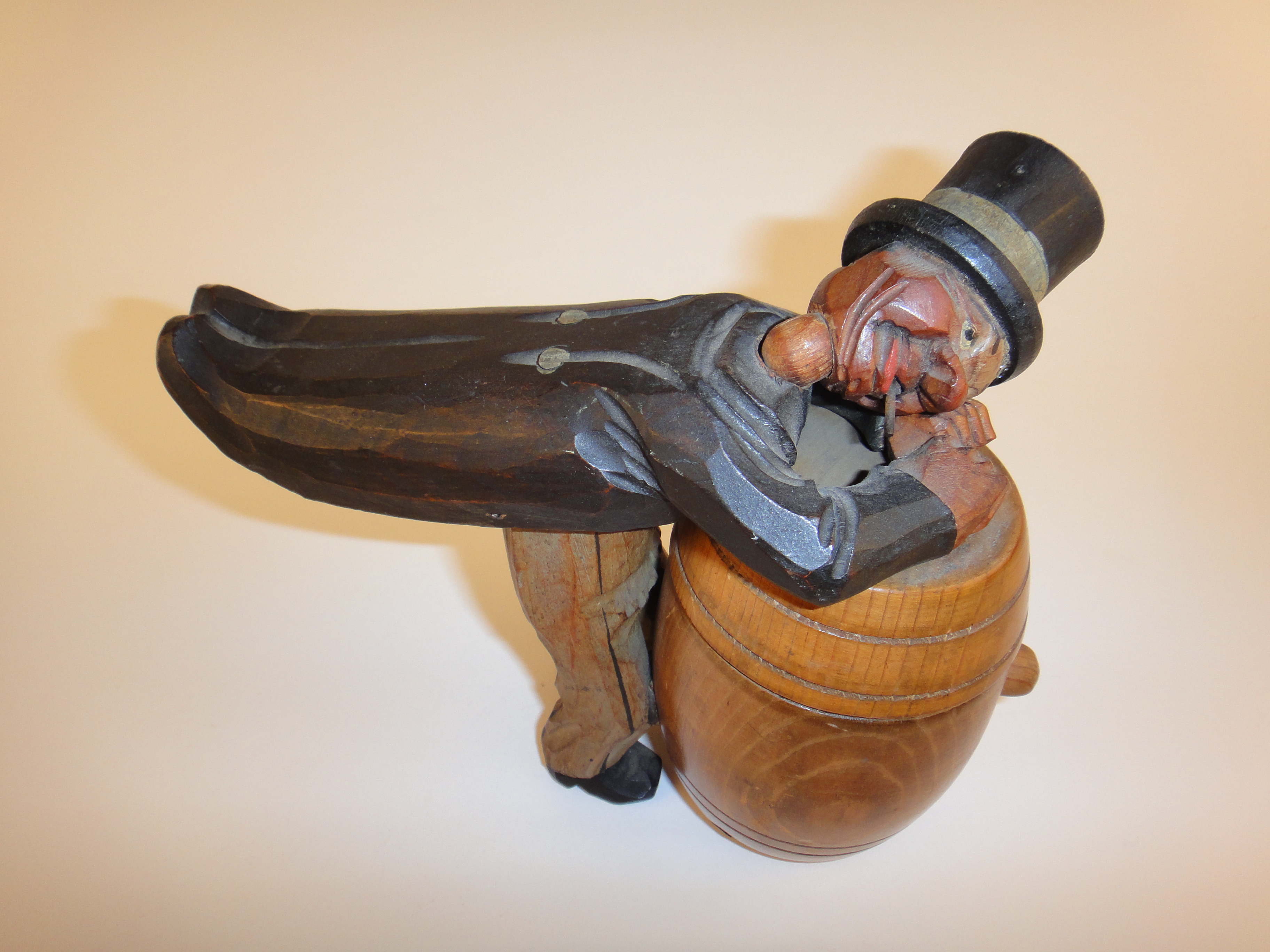 ANRI Wood Carved Man Over Barrel Cigarette Match Holder