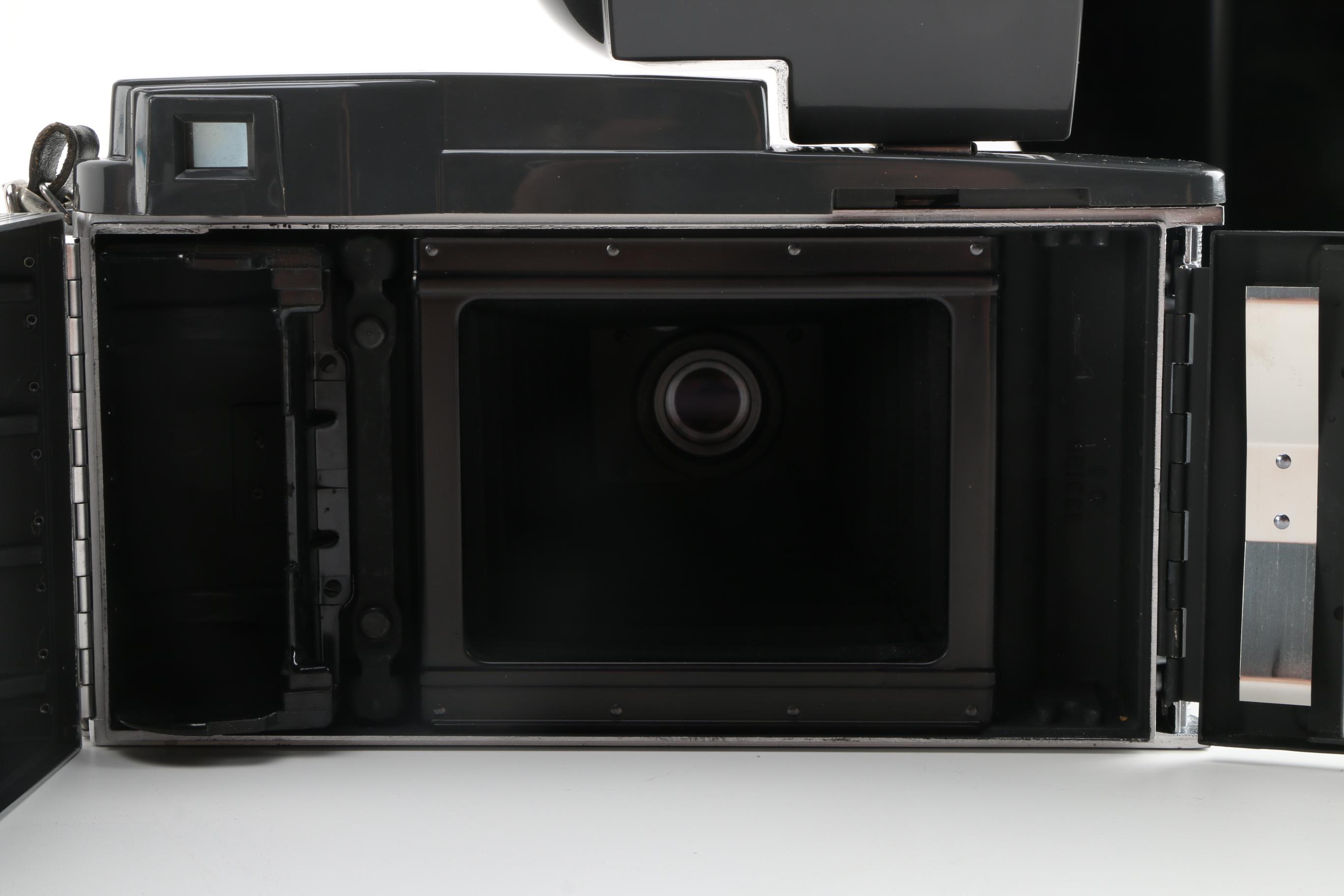 Polaroid 900 Electric Eye Land Camera and Accessories