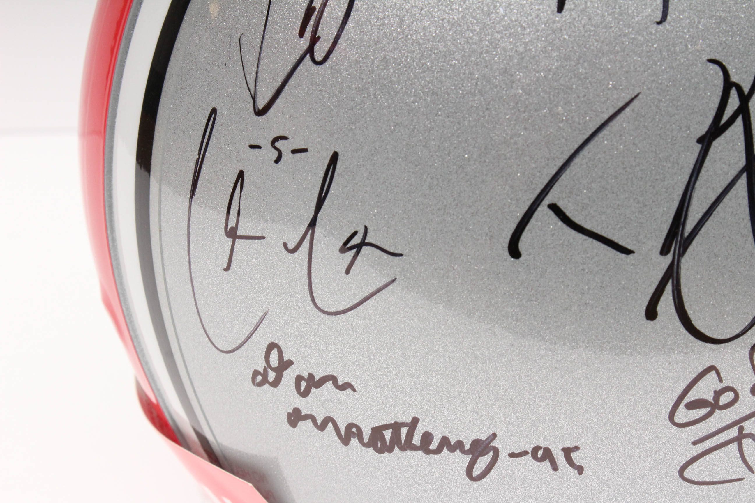 Jim Tressel and Players Autographed OSU Helmet