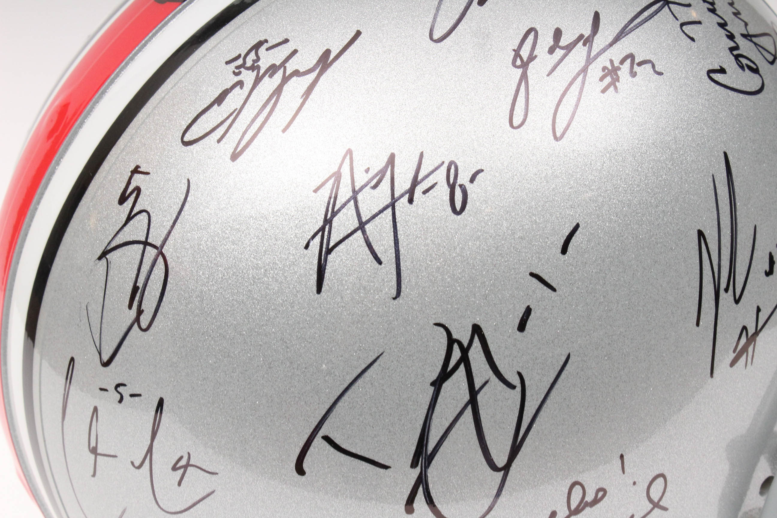 Jim Tressel and Players Autographed OSU Helmet