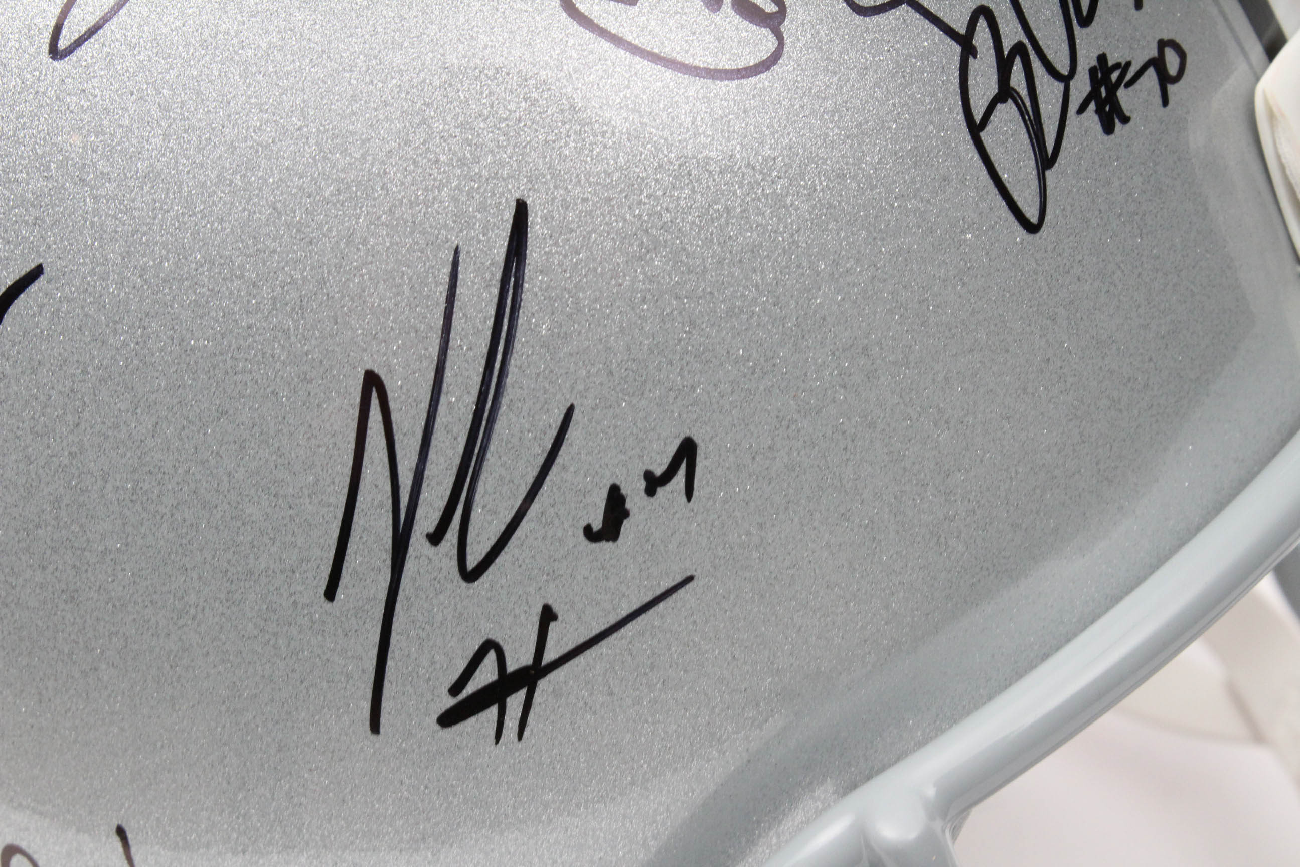 Jim Tressel and Players Autographed OSU Helmet